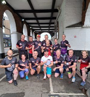 Pointing the way to this year's T-shirt design . . . that's Bridgnorth Running Club members promoting this year's race.