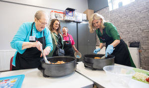 The Duchess is led through a cooking lesson at the Big Venture Centre