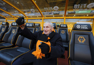Archie enjoys sitting in the dugout