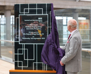 King Charles III unveils a plaque during his visit on Wednesday September 3, 2025