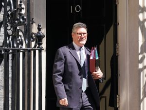 Sir Keir Starmer leaves Number 10 in bright sunshine