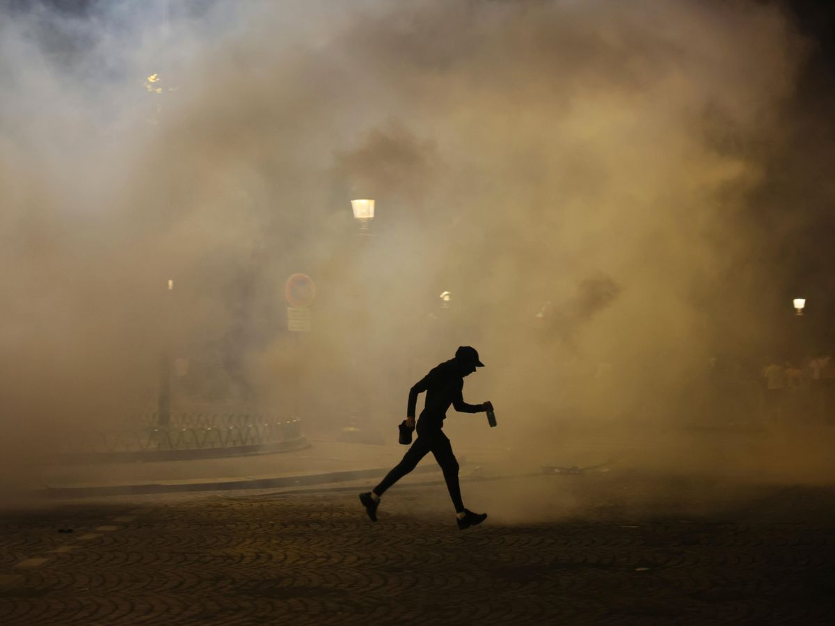 Two fans die and police officer in coma after Champions League celebrations