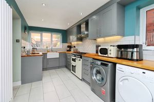 The modern kitchen has integrated appliances and a range cooker