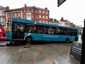 The front of the bus was jacked up as recovery workers prepared to move it
