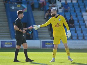 Supporting image for story: Fan removed from AFC Telford match after object thrown at opposition player