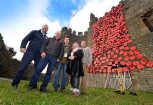 The poppy cascade at Dudley Castle has been organised by the Dudley Remembers group. Group member Rose Cook Monk, Andy Monk, Ian Rawlings and Steve Parkes poses with zoo manager Matt Lewis