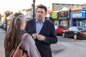 Telford MP Shaun Davies speaking with a local resident