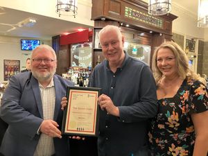 L-r - Ian Simpson, chairperson of Stourbridge & Halesowen CAMRA, with Pete and Ruth Walker at The Seven Stars