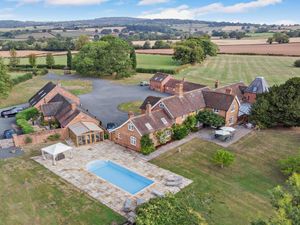 Supporting image for story: 'Idyllic' south Shropshire home with Welsh longhouse, outdoor swimming pool and two additional properties up for sale