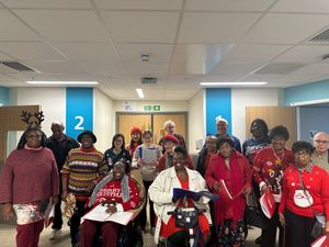 The SRB Choir performs for patients at Midland Met.
