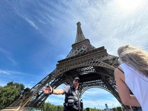 Supporting image for story: Police arrest man climbing Eiffel Tower following evacuation of landmark