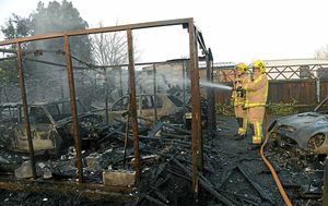 Firefighters dampen down after the Ellesmere blaze