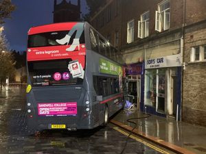 The bus after it crashed into Sophie's Place, Dudley. Photo: West Midlands Fire and Rescue Service