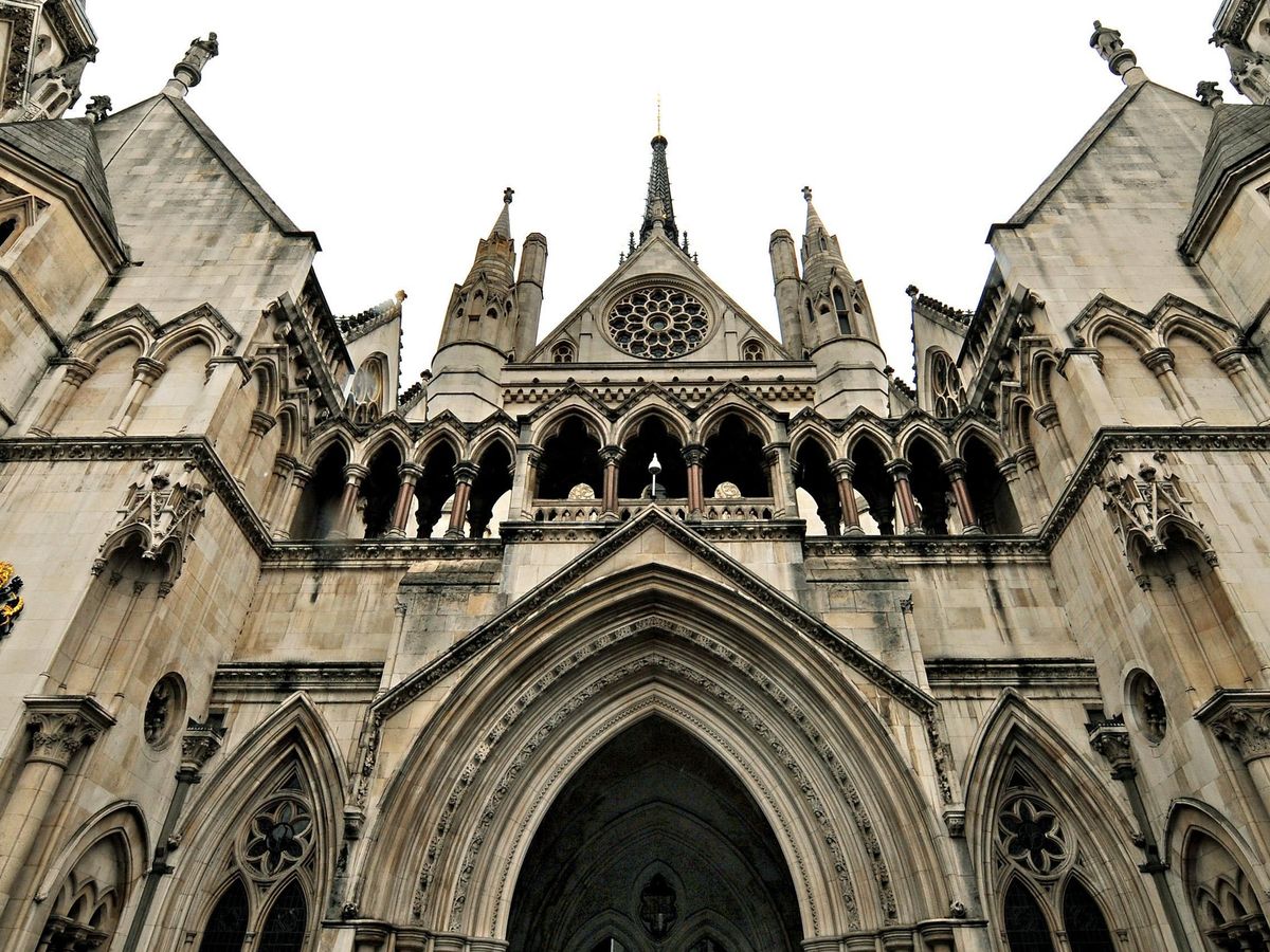 Migrants lose late-night High Court bids to block removal to France