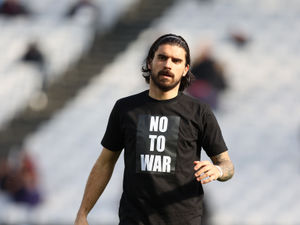 Supporting image for story: Wolves players wear No To War t-shirts before West Ham match