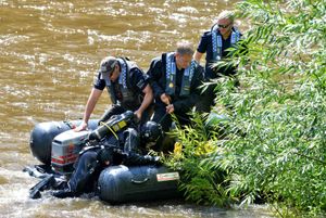 Police searching the River Severn in Coalport, Ironbridge