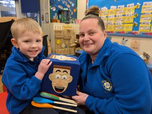 With the emotions cube and spoon puppets, 4-year-old Roman Whitehouse and Little Trinity’s Emma Browning.