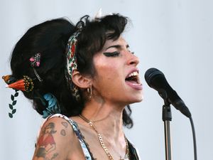 Supporting image for story: Amy Winehouse items including handwritten lyrics to be auctioned