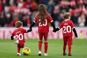 Jota's children on the pitch before the game (Photo by Jan Kruger/Getty Images)