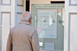 A sign in the window