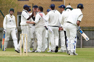 Wellington celebrate as Walsall's James Middleton is out.