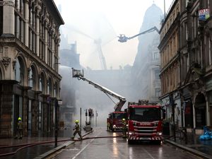 Supporting image for story: Glasgow Central station partially reopens after fire ravaged nearby building