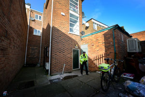 Police stand guard after the tragedy