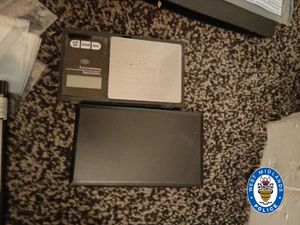 Police said scales and other 'drug dealing paraphernalia' was found at the address. Photo: West Midlands Police