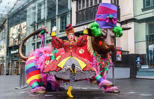 Panto Dame Andrew Ryan meets the Bull outside the Bullring in Birmingham City Centre.