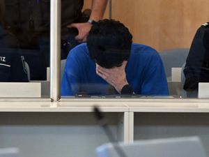 Supporting image for story: Suspect in fatal knife attack at German festival admits killings as trial starts