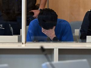 Supporting image for story: Suspect in fatal knife attack at German festival admits killings as trial starts