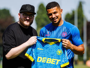 Supporting image for story: 'Unleash the Lobos': Wolves fan and Brazilian players team up to design unique third kit