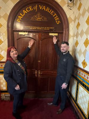 Angela Nelson and Nathan O'Neil with the rediscovered Palace of Varieties sign at the Bartons Arms
