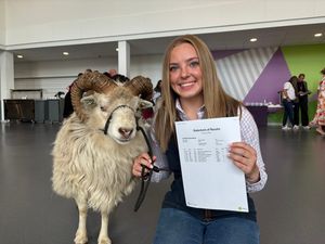 Supporting image for story: Shear delight for teenager who took sheep to collect GCSE results