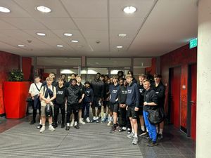 With Bayer Leverkusen's Victor Boniface. Photo: Amethyst Sixth Form