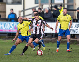 Captain Michael McGrath keeps possession. Pic: Jim Wall