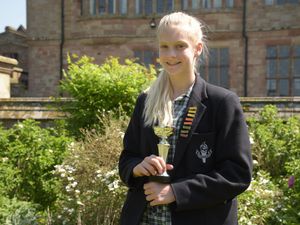 Supporting image for story: Market Drayton schoolgirl jumping for joy after making national trampoline finals