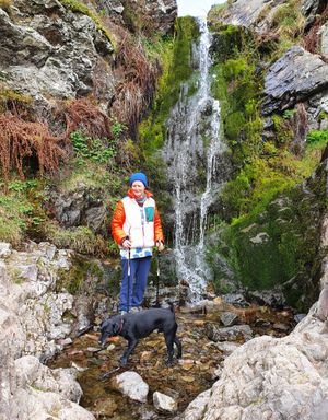 Bridget and her dog Sparkle enjoy a walk.