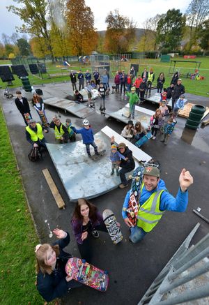 Project leader Tom Rochester alongside eight-year-old Toby Russell, three-year-old Tycho Rochester, Paul and Dominic Barnes, Andrew Lewis-Price and other community members