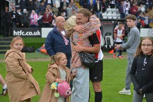 Players hugged their families as they celebrated their well earned victory