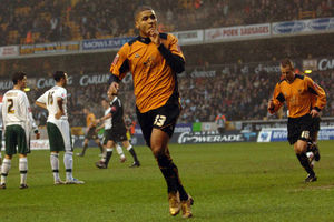 Leon Clarke tells fans to shush after scoring. The Wolves fans, that is