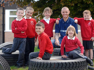 Supporting image for story: Football star hits the net with poetry session at Shropshire school