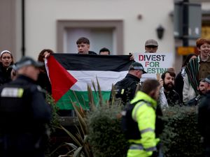 Supporting image for story: Police officers injured during protest as Hillary Clinton visited Belfast