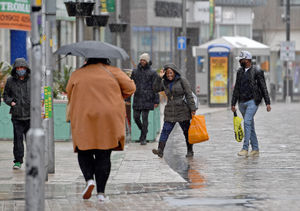 Shoppers brave the storm in Dudley Street, Wolverhampton