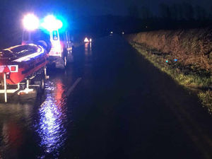 Supporting image for story: People rescued from cars and flood defences up in wake of Storm Imogen