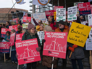 Supporting image for story: Protesters from across Wales descended on the Senedd to take part in a demonstration against plans to build some of the UK’s tallest turbines near to rural communities