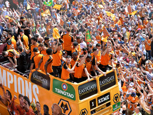 Supporting image for story: Wolves fans and players celebrate during promotion parade - GALLERY