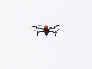 A drone pictured in the air
