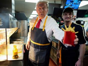 Supporting image for story: Donald Trump hands out fries and holds drive-thru news conference at McDonald’s