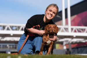 Paralympian Ellie Simmonds, newly announced in the presenting line-up for the Crufts TV show, with a Cocker Spaniel puppy from West Midlands Police during the official launch of Crufts Dog Show 2025 at the NEC Birmingham. PA Photo. Photo: Jacob King/PA Wire